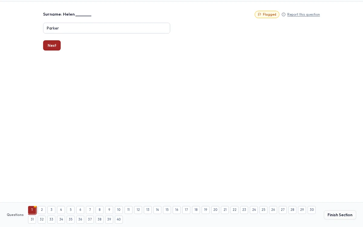 The IELTS Listening screen: a gap-fill answer, the question flagged and the 40-question navigator below